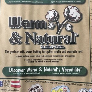 May include: A brown paper bag with the text "Warm & Natural" in large black letters. The bag is advertising needled cotton batting for quilts, crafts, and wearable art. The text "Discover Warm & Natural's Versatility!" is printed in a green box. The bag also features a small American flag and the text "Made in the USA".