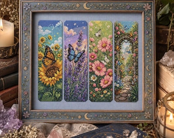 May include: A framed set of four vertical cross-stitch bookmarks featuring nature scenes. The designs include a monarch butterfly on sunflowers, a blue butterfly over lavender, pink cosmos flowers with white butterflies, and a stone garden archway.