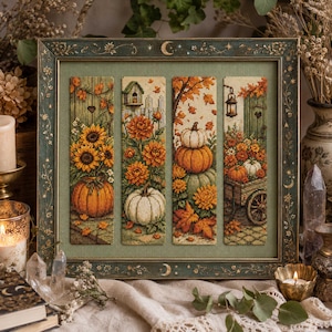May include: A framed cross-stitch artwork featuring four vertical panels depicting autumn scenes. The panels show sunflowers in a pumpkin, orange flowers with a birdhouse, stacked pumpkins with fall leaves, and a wooden cart filled with pumpkins.