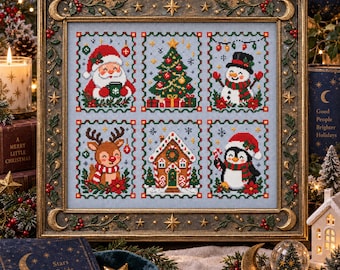 May include: A framed cross-stitch sampler featuring six distinct holiday-themed panels on a light blue background. The panels depict Santa Claus, a decorated Christmas tree, a snowman, a reindeer, a gingerbread house, and a penguin in winter attire.
