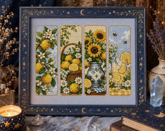 May include: A framed cross-stitch embroidery featuring four vertical panels depicting lemon branches, a basket of lemons with daisies, a vase of sunflowers, and a glass of lemonade with bees, all set within a dark blue frame with gold stars.