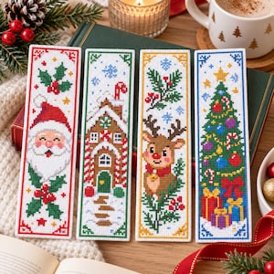 May include: Four rectangular cross-stitch bookmarks featuring festive designs. The first shows Santa Claus with holly, the second a gingerbread house, the third a reindeer with pine branches, and the fourth a decorated Christmas tree with gifts.