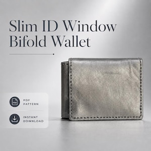 May include: A grey bifold wallet with visible stitching along the edges. The text Slim ID Window Bifold Wallet is displayed above the wallet, with icons for PDF Pattern and Instant Download visible on the left side of the image.
