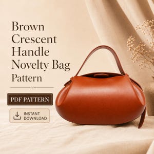 May include: A brown crescent-shaped novelty bag with a single handle. The text on the image reads: Brown Crescent Handle Novelty Bag Pattern, PDF PATTERN, and INSTANT DOWNLOAD. The bag has a smooth, rounded silhouette and a top closure.