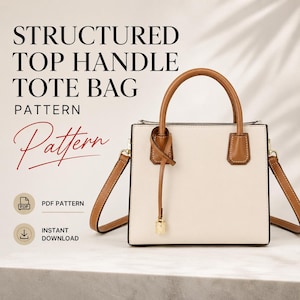 May include: A structured top handle tote bag with a cream-coloured body and tan leather accents, including two top handles and a detachable shoulder strap. A decorative tan leather tie hangs from one handle with a gold-tone metal charm. Text reads: STRUCTURED TOP HANDLE TOTE BAG PATTERN, Pattern, PDF PATTERN, INSTANT DOWNLOAD.