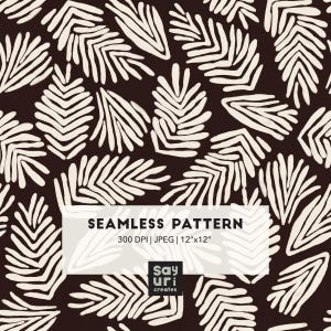 Puede incluir: Un patrón continuo con formas de hojas tipo helecho dibujadas a mano en color blanco roto sobre un fondo marrón oscuro. Un recuadro blanco muestra el texto: SEAMLESS PATTERN, 300 DPI | JPEG | 30,48 cm x 30,48 cm y el logo say uri creates.