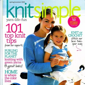 May include: Knit Simple magazine cover featuring a woman and a child wearing blue crocheted sweaters. The magazine title is in green and yellow lettering. The cover text reads "101 top knit tips from our experts".