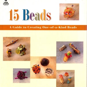 May include: A book cover with the title "15 Beads: A Guide to Creating One-of-a-Kind Beads" by Jane Dunnewold. The cover features colorful beads and a variety of bead-making techniques.