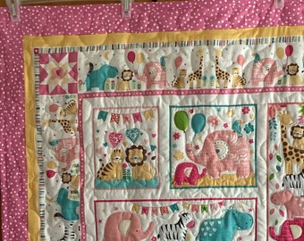 Baby girl jungle quilt with pink pink flannel backing, toddler jungle animal quilt- 41" by 48"