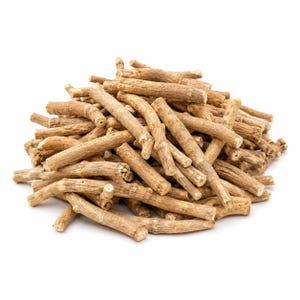 May include: A large pile of light brown, dried woody roots. Each individual root piece is cylindrical, featuring a rough, textured bark surface with visible nodes and irregular markings, stacked together in a dense, conical mound.
