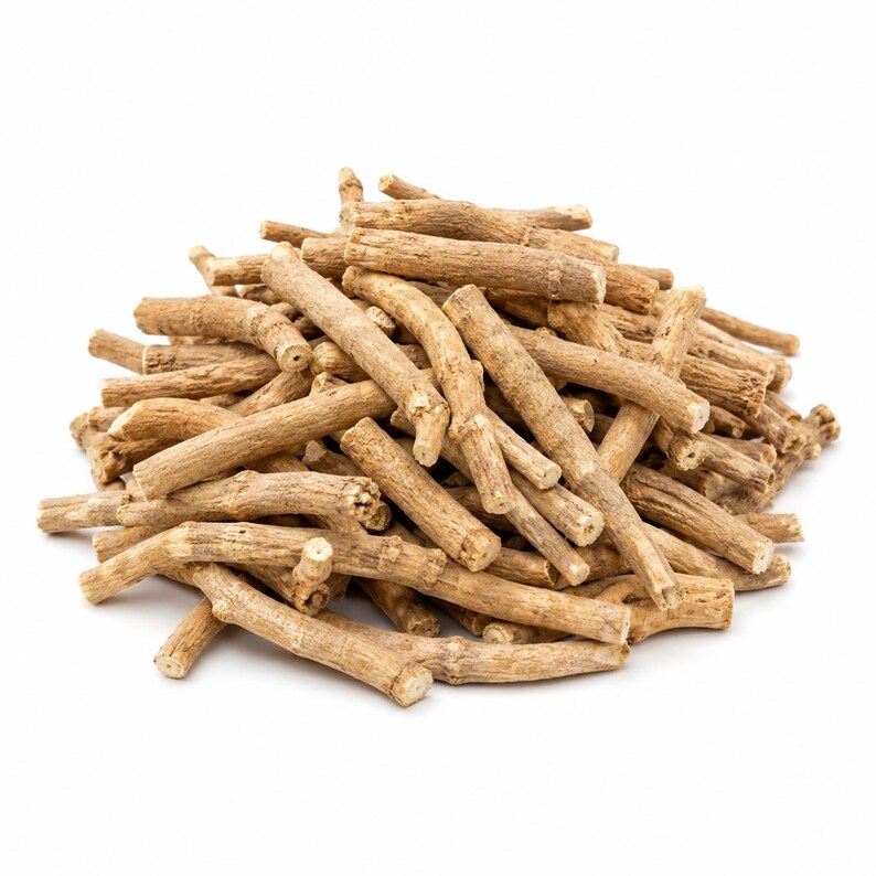 May include: A large pile of light brown, dried woody roots. Each individual root piece is cylindrical, featuring a rough, textured bark surface with visible nodes and irregular markings, stacked together in a dense, conical mound.