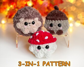 Può includere: Tre figure in uncinetto di peluche tra cui un riccio marrone, una ghianda marrone e un fungo rosso e bianco. Ogni figura ha occhi di sicurezza neri e guance ricamate in rosa. Il testo 3-IN-1 PATTERN NO SEW è visualizzato in basso.