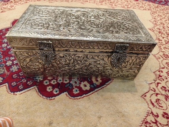 Hand-carved antique-style Indian silver chest that doubles as a statement jewelry box — the kind of heirloom-looking piece you'd spot in a boutique for triple the price.