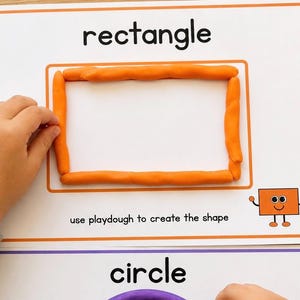 May include: A white educational activity sheet with an orange border featuring the word rectangle at the top and the text use playdough to create the shape at the bottom. An orange playdough rectangle is formed in the centre of the page.