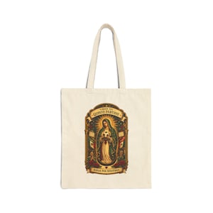 May include: Cream-colored tote bag featuring a religious image with the text "VIRGEN DEL QUINTO PARTIDO" and "RUEGA POR NOSOTROS". The image depicts a woman in a white and green gown holding a soccer ball, surrounded by roses and flags.