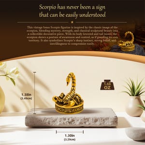 May include: A brass scorpion figurine featuring a raised tail and a circular base with the Scorpio zodiac symbol. The figurine measures 1.38 inches in height and 1.30 inches in width, with a weight of 1.68 ounces. The text reads: Scorpio has never been a sign that can be easily understood.