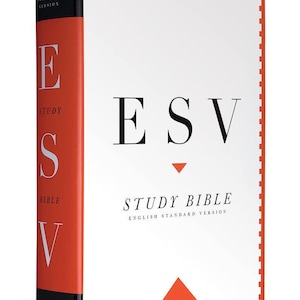May include: A hardcover ESV Study Bible with a white cover and red spine. The title "ESV STUDY BIBLE" is printed in black, with the letters "ESV" prominently displayed. The spine features the word "STUDY" and "BIBLE".