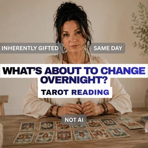 May include: A tarot reading service featuring the text INHERENTLY GIFTED, SAME DAY, WHAT'S ABOUT TO CHANGE OVERNIGHT? TAROT READING, and NOT AI. The image displays a person sitting at a wooden table with a spread of tarot cards arranged in rows.