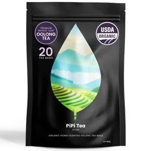 May include: A black pouch of PiPi Tea containing 20 organic honey scented oolong tea bags. The front features a leaf-shaped window displaying a landscape of green terraced fields and mountains. Labels include Premium Whole-Leaf Oolong Tea, USDA Organic, and Net 80g.
