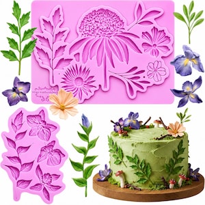 May include: Two rectangular pink silicone molds featuring recessed floral and botanical patterns, including various flower heads, leaves, and stems. The molds display the text "seas embroidery" and are shown alongside finished cake decorations.