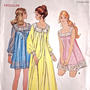 May include: A vintage sewing pattern envelope featuring illustrations of three nightgowns with lace trim. The blue and yellow gowns have long sleeves, while the pink gown is sleeveless. The text reads MEDIUM and Canada 95c. The designs include square necklines and gathered fabric details.