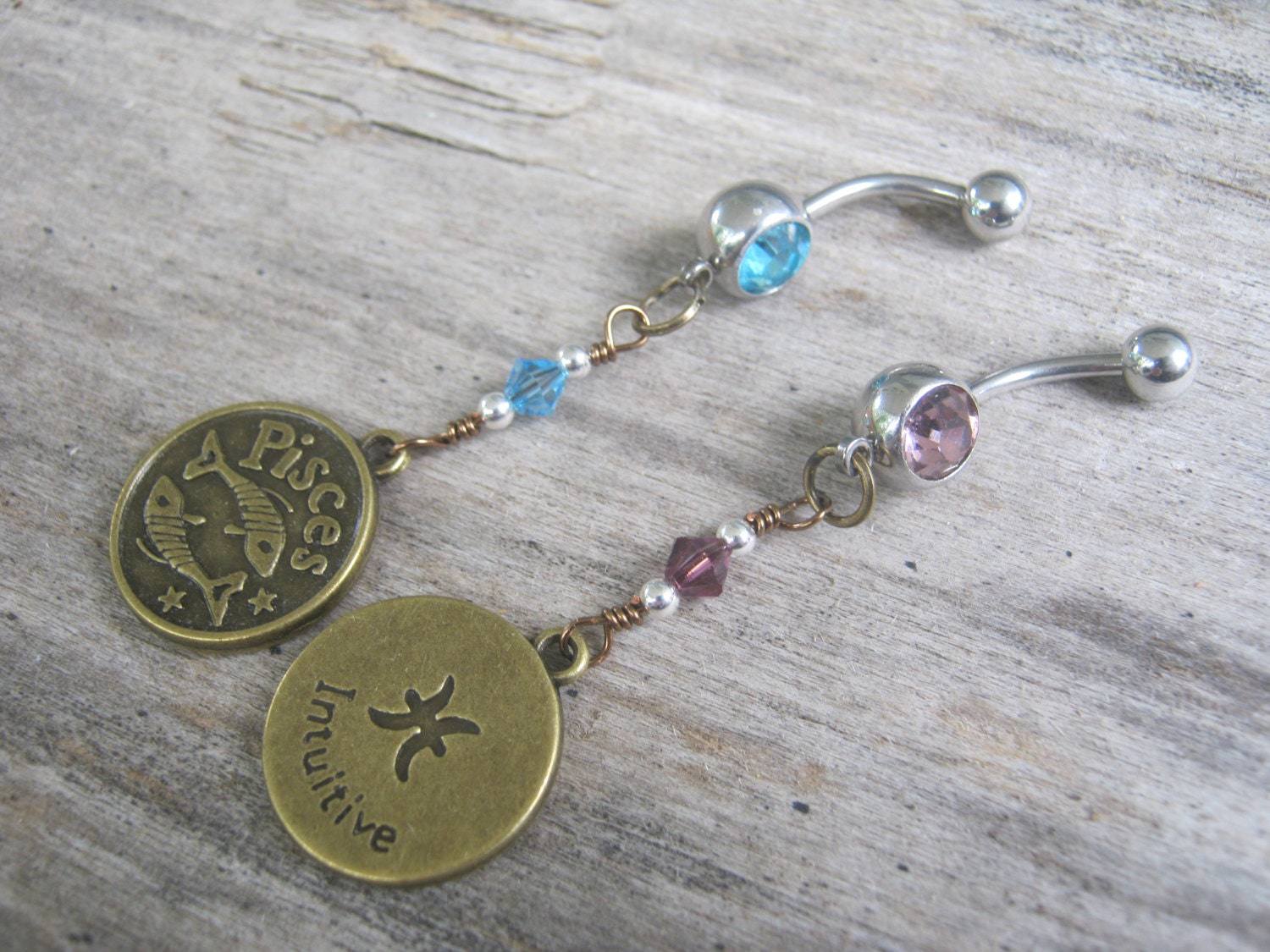 Pisces belly shop button rings