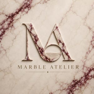 May include: A logo featuring the letters MA with a marble texture in shades of cream and deep burgundy. The letter A contains a circular cutout with horizontal lines. Below the logo, the text MARBLE ATELIER is centered above a thin horizontal line.