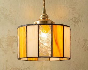 Handgefertigte Pendelleuchte aus bernsteinfarbenem Glas, geometrische Trommellampe, Mid-Century-Dekor