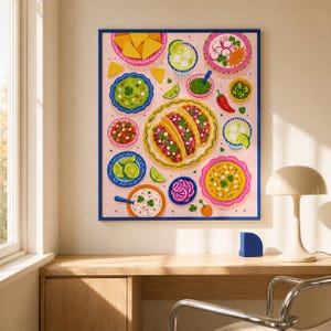 Peut inclure: Une affiche murale encadrée présentant une illustration colorée de cuisine mexicaine, incluant des tacos, du guacamole, de la salsa, des quartiers de citron vert, des chips de tortilla et divers bols sur un fond carrelé rose avec un cadre bleu.