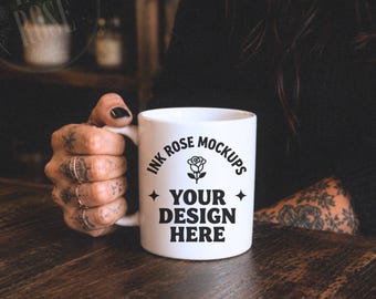 White Ceramic Mug Mockup Tattooed Woman at Wooden Table Moody Coffee Cup Mockup Lifestyle Product Display JPG