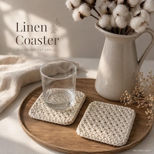 May include: Two square, off-white crocheted coasters with a textured stitch pattern. One coaster supports a clear glass tumbler. The text "Linen Coaster DIGITAL PDF PATTERN" and "PATTERN ONLY" is visible in the image.