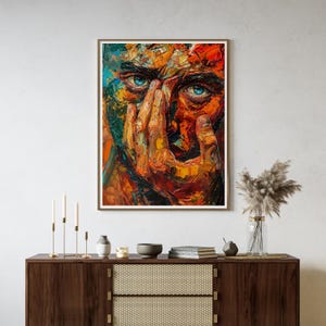 Peut inclure: Une impression d'art mural rectangulaire représentant une peinture à l'huile d'un visage partiellement masqué par une main. L'œuvre utilise des coups de pinceau épais et texturés dans des tons vifs d'orange, rouge, bleu et jaune.