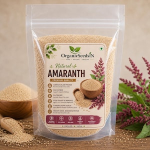 Peut inclure: Un sachet transparent rempli de graines d'amarante beige clair. L'étiquette porte le texte OrganicSeedsIN, Natural AMARANTH et Premium Quality, ainsi que des icônes et du texte détaillant les bienfaits nutritionnels comme les protéines.
