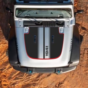 May include: A silver vehicle hood featuring a black center decal with two vertical white stripes and the text 1941 printed in white. The decal is outlined with a thin red border and includes two black rectangular vents on the hood surface.