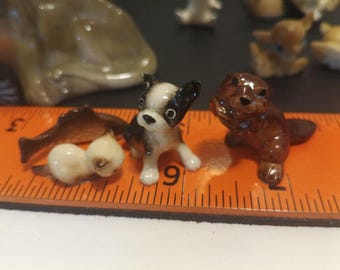 Lot of four Hagen Renaker miniature porcelain figurines.