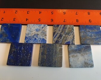 1.5x1.5x1/4" Lapis lazuli polished stones.