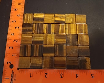 3/4"x3/4"x1/8" tiger eye polished stone.