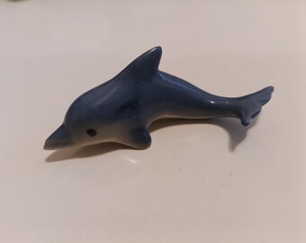 Hagen Renaker miniature porcelain dolphin.