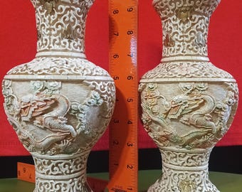 Chinese dragon carved resin vase pair.
