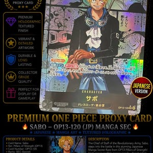 May include: A Japanese One Piece trading card featuring the character Sabo with blonde hair, goggles, and a dark coat. The card has a holographic textured finish and displays manga panels in the background with Japanese text and the number 7000.