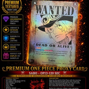 May include: A One Piece Sabo Wanted collectible trading card featuring a premium holographic textured finish. The card displays the character Sabo in a hat, the text WANTED DEAD OR ALIVE, a power level of 7000, and game-specific ability text.