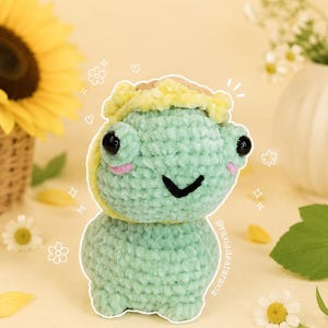 Little frog with a sunflower hat