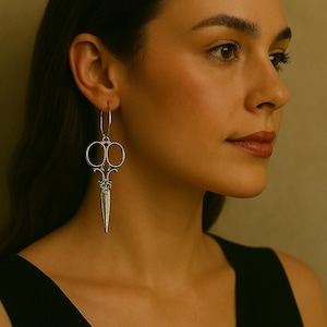 Small silver hoop earrings with Edward Scissorhands steampunk scissors