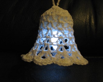 Light up crochet bell in UK & Australian terms uses a battery tea light inside. Perfect for Christmas or Wedding decor.