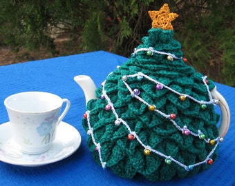 Patrón en PDF con términos del Reino Unido y Australia para un acogedor té de árbol de Navidad en crochet.