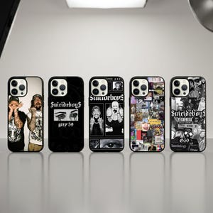 May include: Five smartphone cases featuring black and white graphic designs related to the musical duo $uicideboy$. The designs include portraits of the artists, collage imagery, text reading $uicideboy$, grey 59, and parental advisory labels.