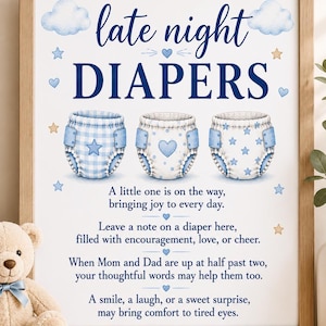 May include: A framed sign with the text late night DIAPERS and a poem about leaving notes on diapers. The design features three illustrated baby diapers with blue patterns, blue clouds, and small stars on a white background in a wooden frame.
