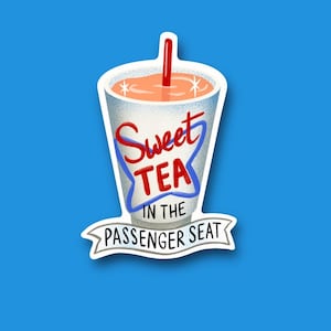May include: A white and blue sticker with a red and white illustration of a cup of sweet tea with a red straw. The text "Sweet Tea in the Passenger Seat" is written on the sticker.