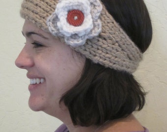 Hand knit headband in beige  color yarn with crocheted flower accent. Only one available.