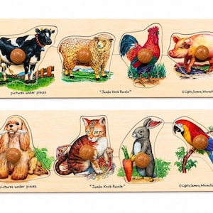 May include: Two rectangular wooden puzzle boards featuring illustrations of animals including a cow, sheep, rooster, pig, dog, cat, rabbit, and parrot. Each puzzle piece has a large round wooden knob and the text Jumbo Knob Puzzle.